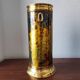 Flame-patterned golden umbrella stand