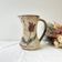 Ceramic pitcher from Les grottes dieulefit with floral pattern from the 1970s