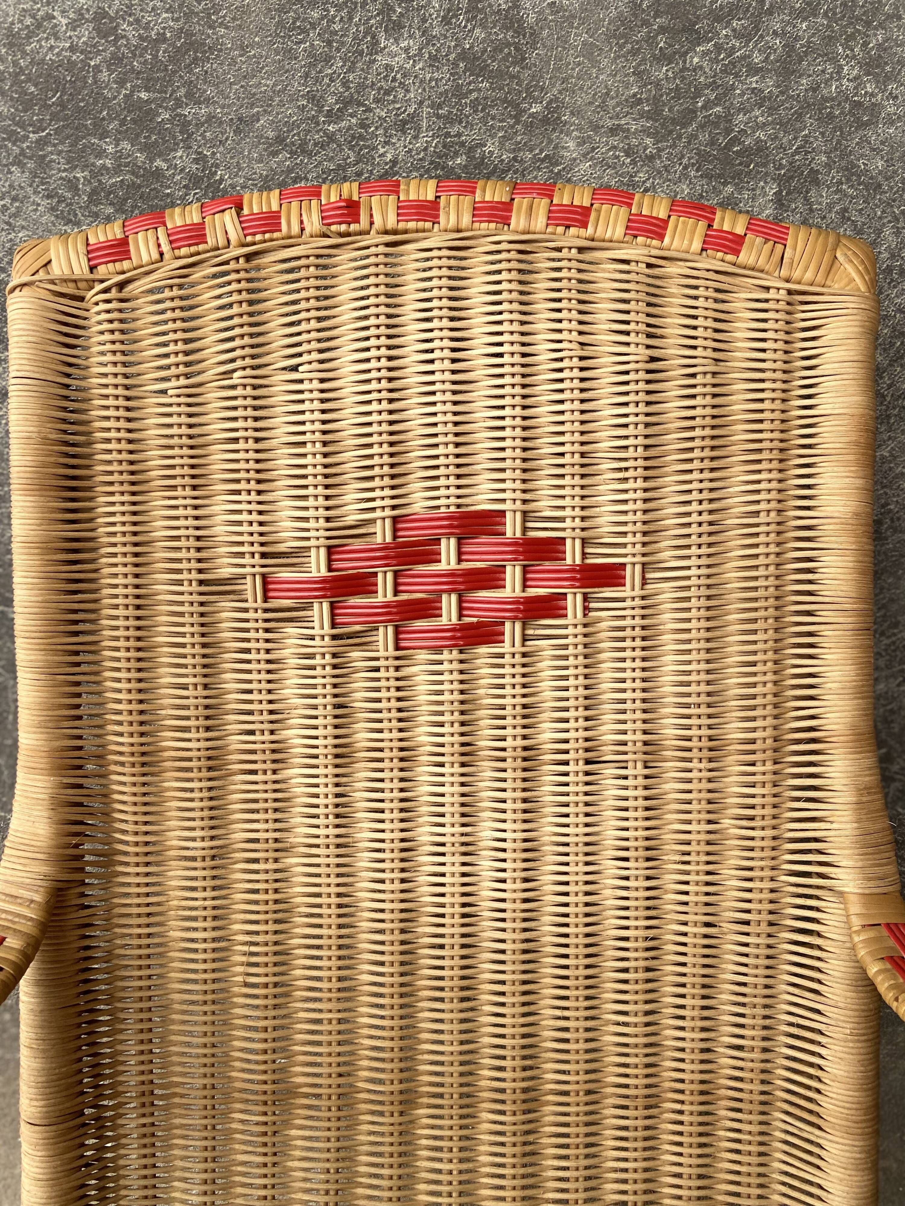 Vintage braided rattan armchair