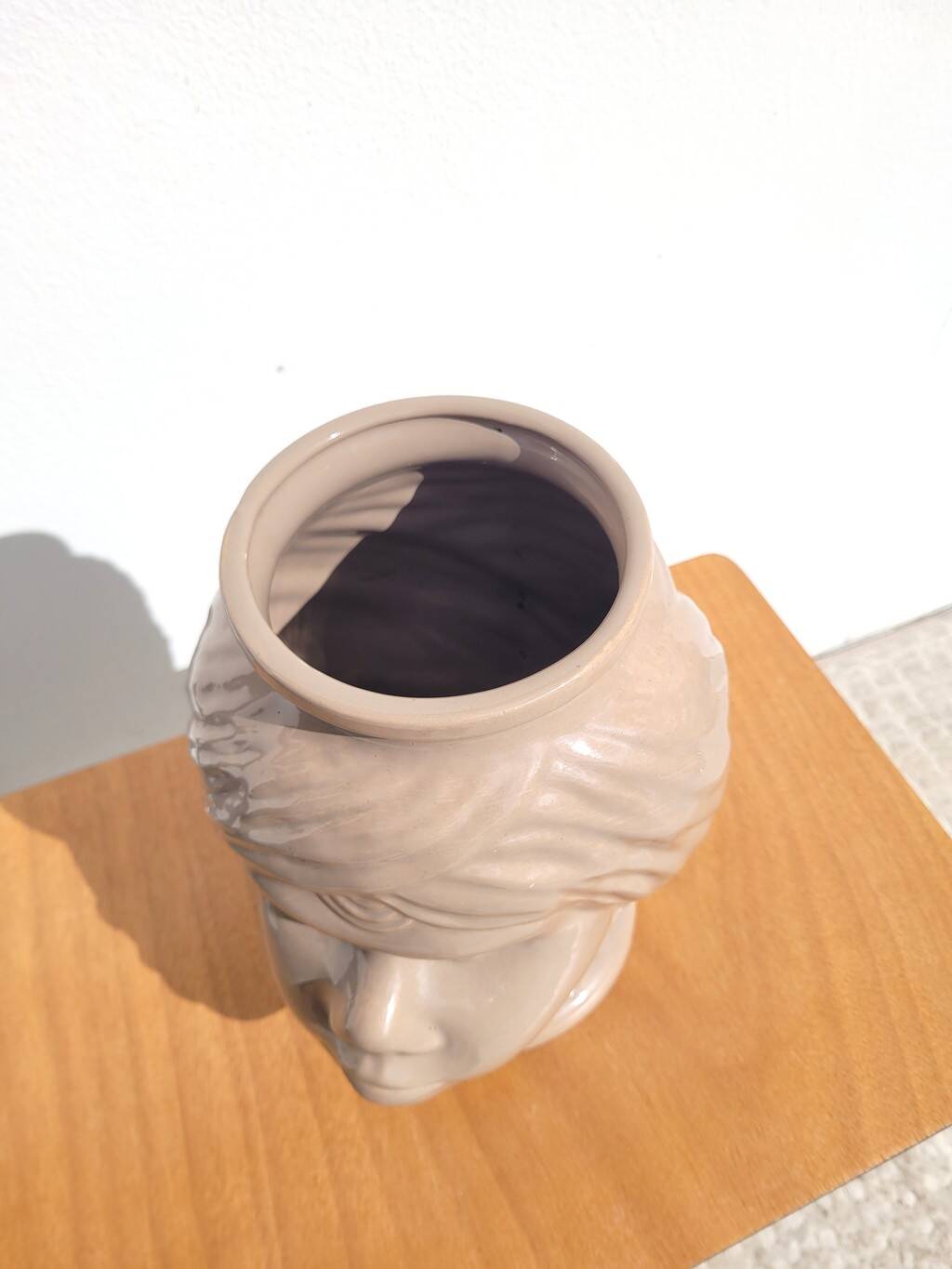 Ceramic face cachepot vase