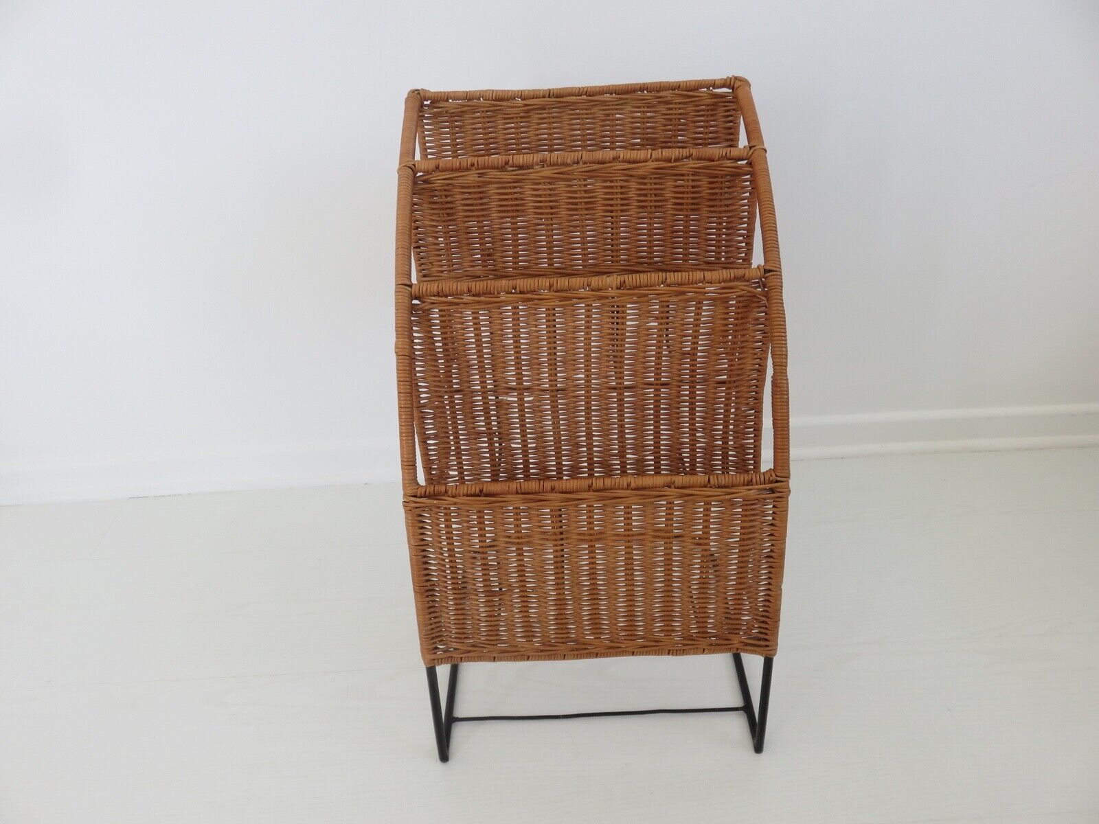 Rattan magazine door by Raoul Guys 1950