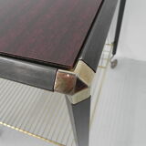 Table basse vintage sur roulettes avec porte-bagages
