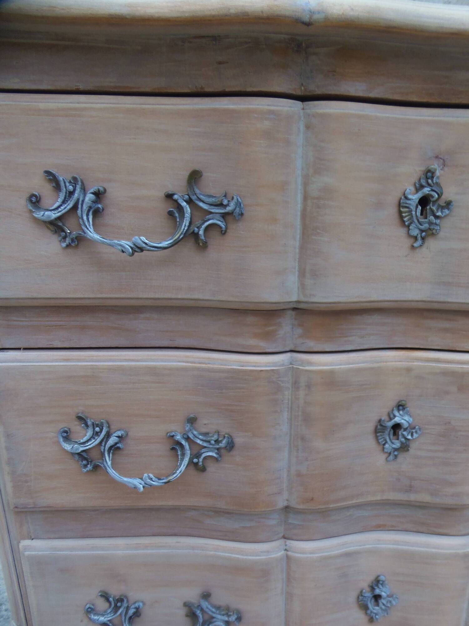 Beautifully crafted Louis XVI style commode in bleached wood.