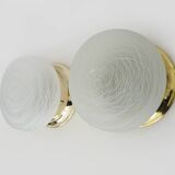 Pair of wall or ceiling lights with white-edged globe. 80 years