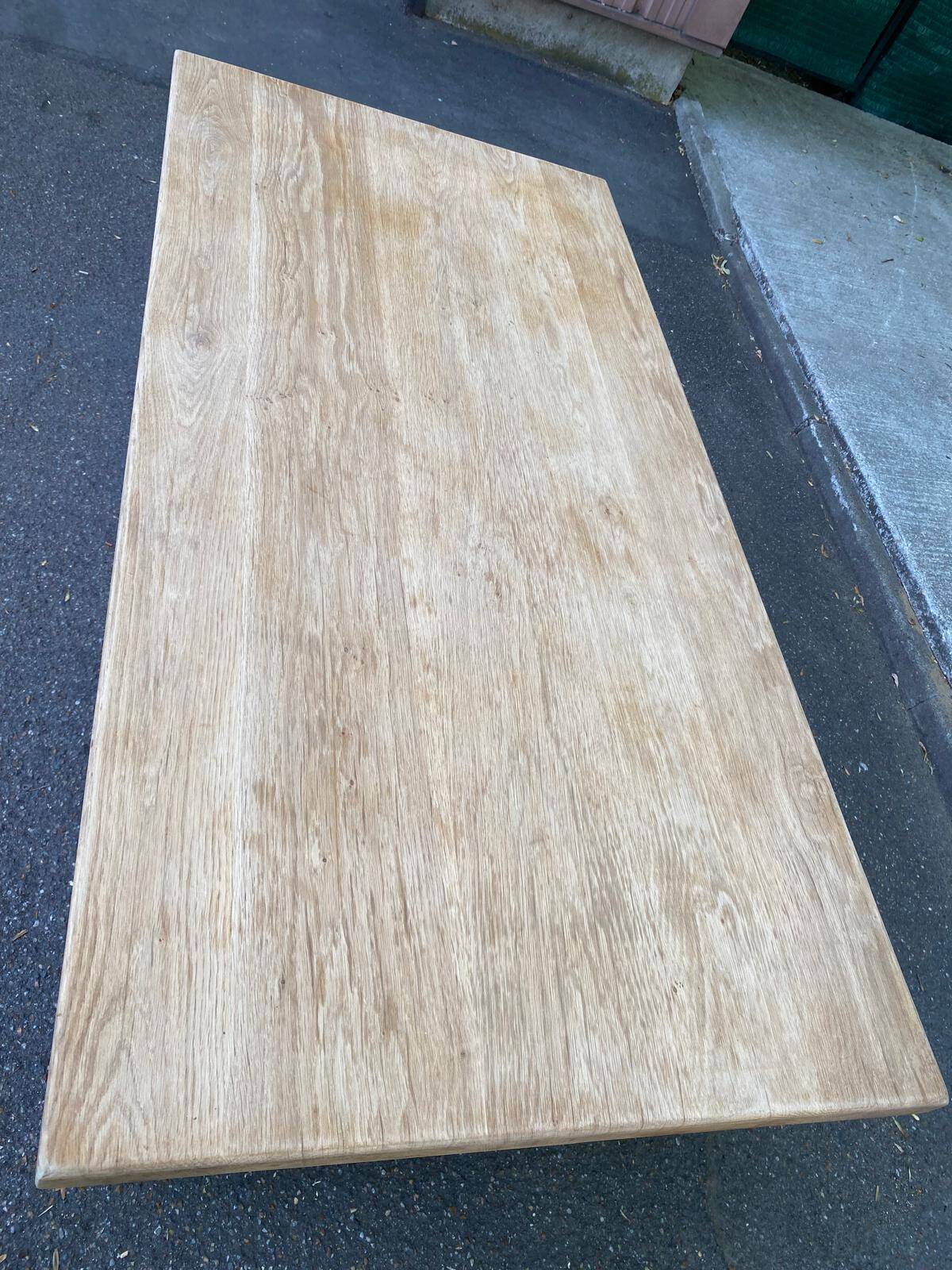 Renovated extendable farmhouse dining table made of solid raw oak from the 1950s.