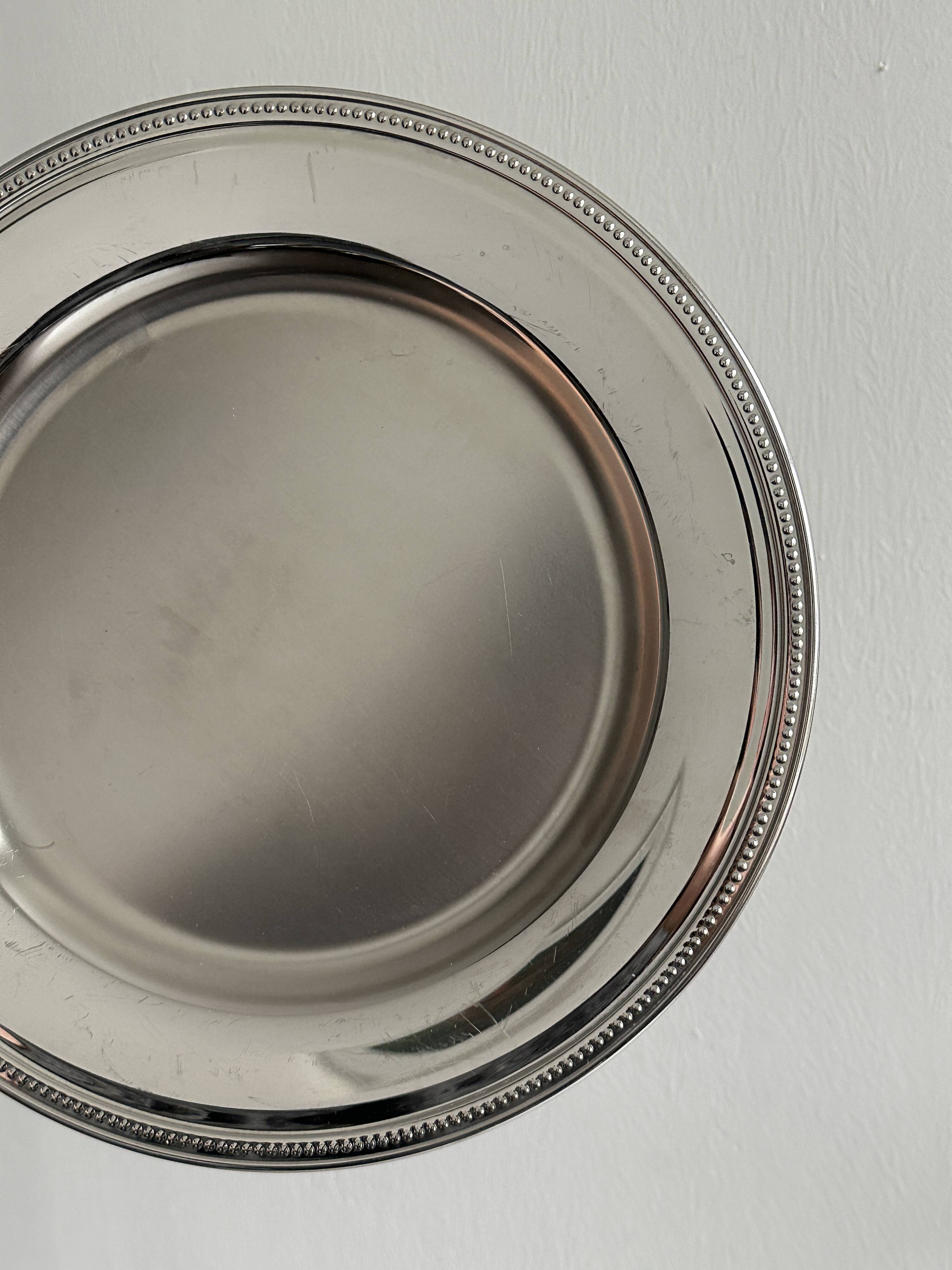 Large shiny stainless steel tray