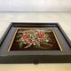 Small painting of a bouquet of flowers signed