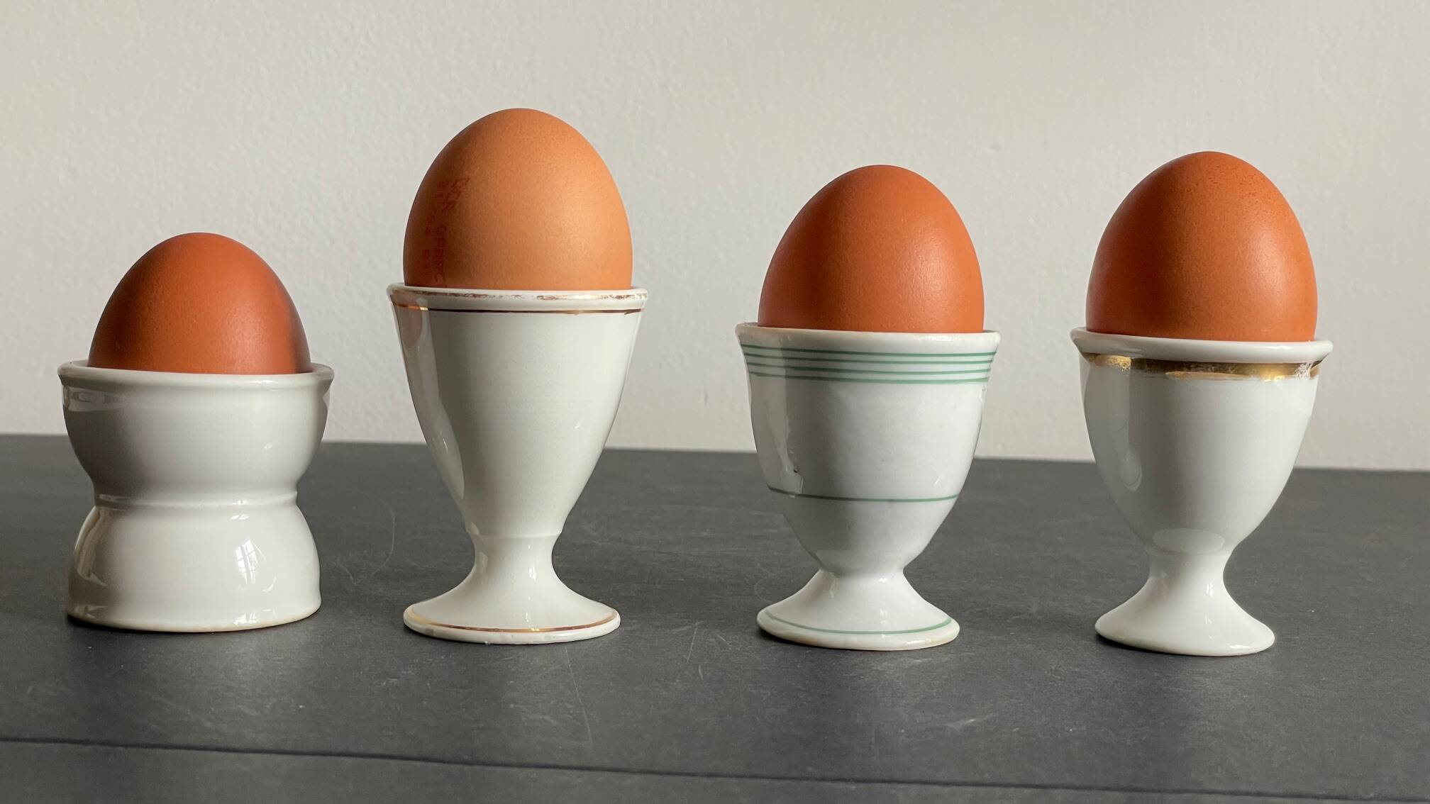 4 antique ceramic egg cups