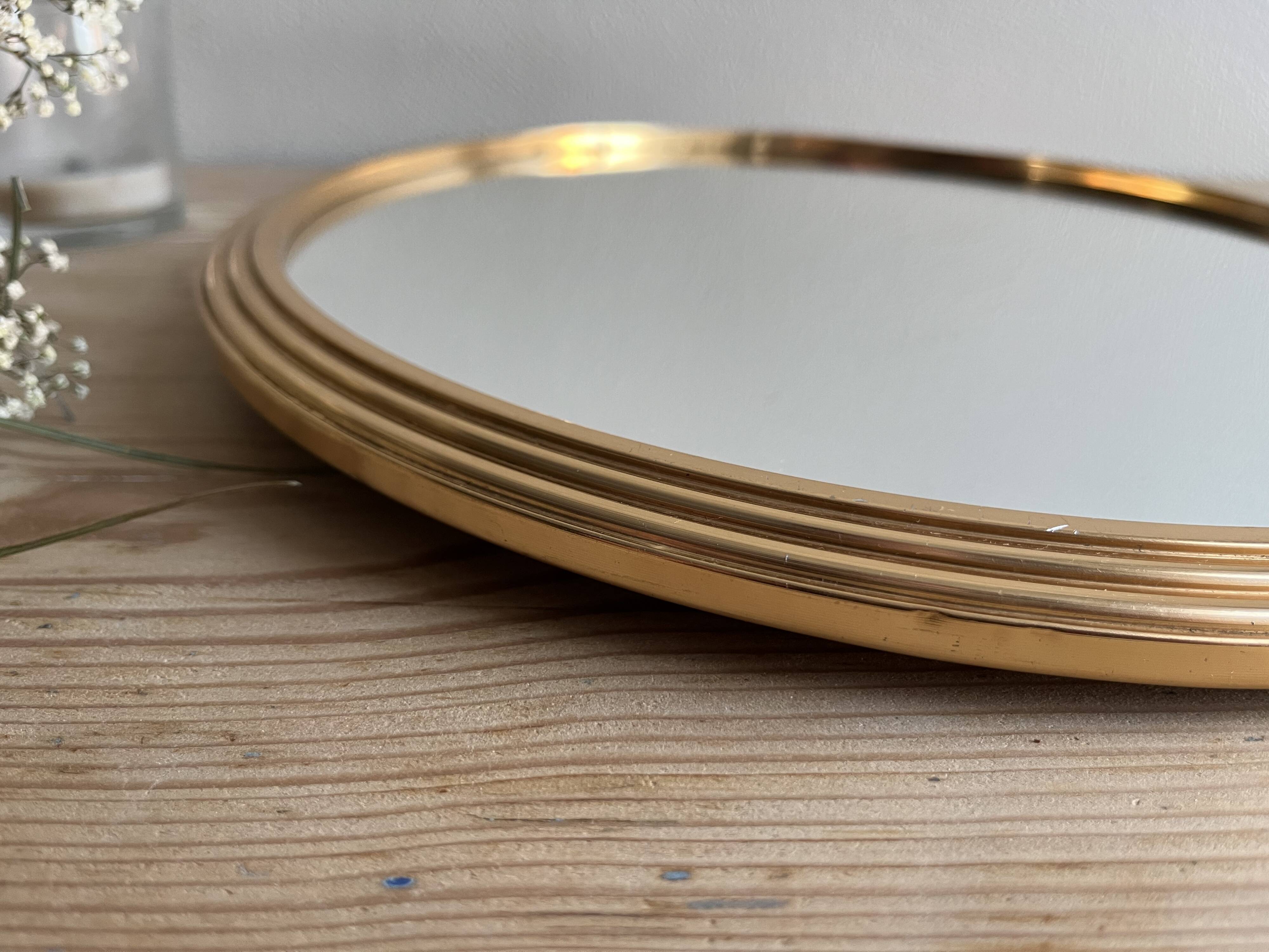 Vintage round gold mirror