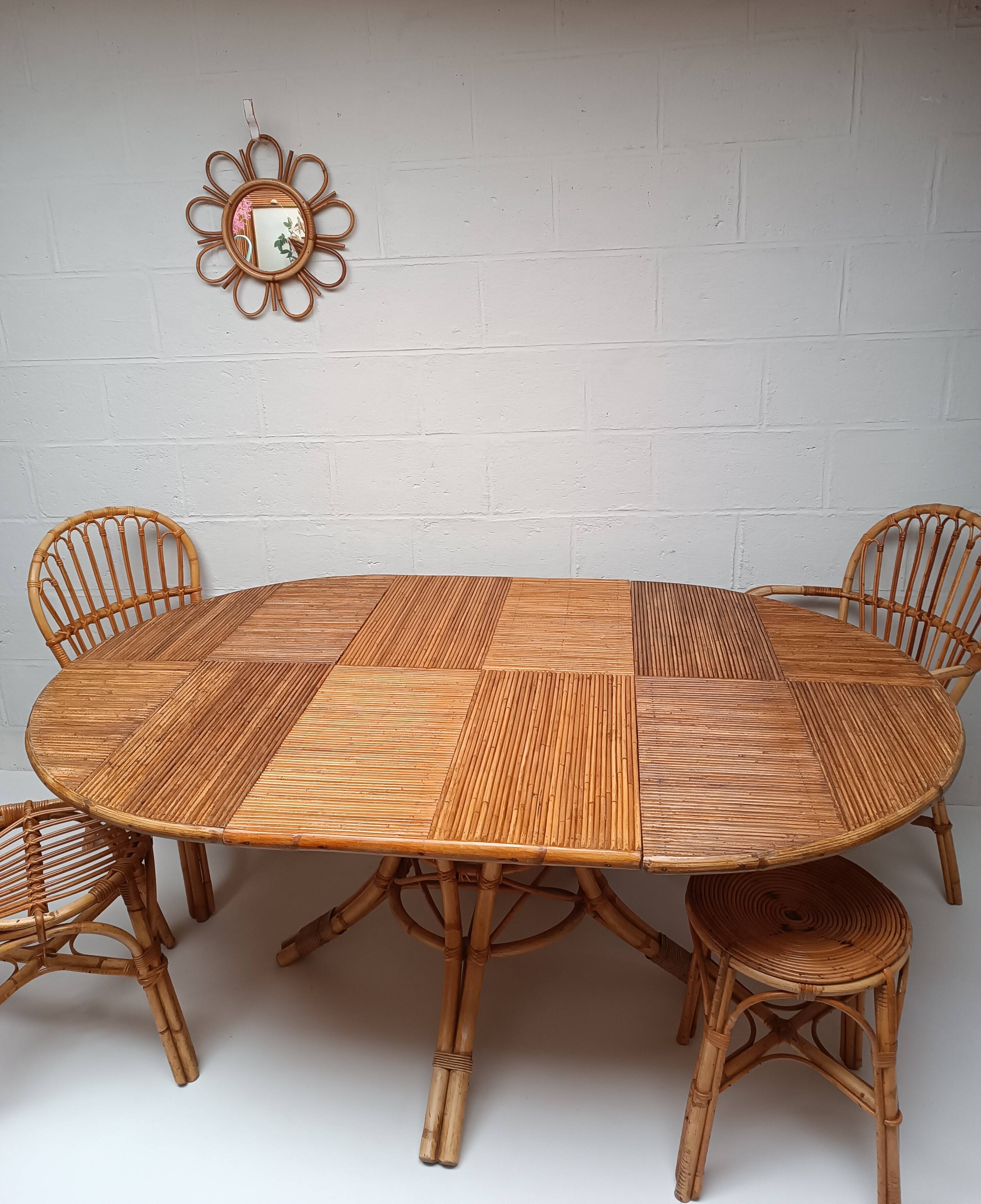 Bamboo table with extensions, 3 chairs and 3 stools from the 1960s.