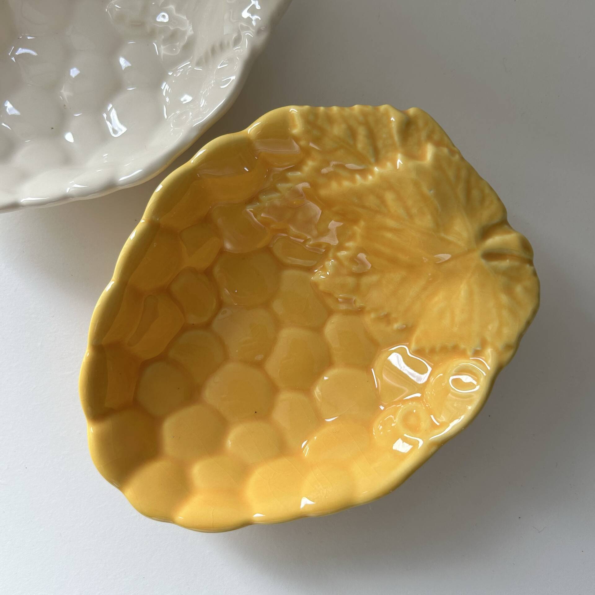 2 grape bowls in slipware