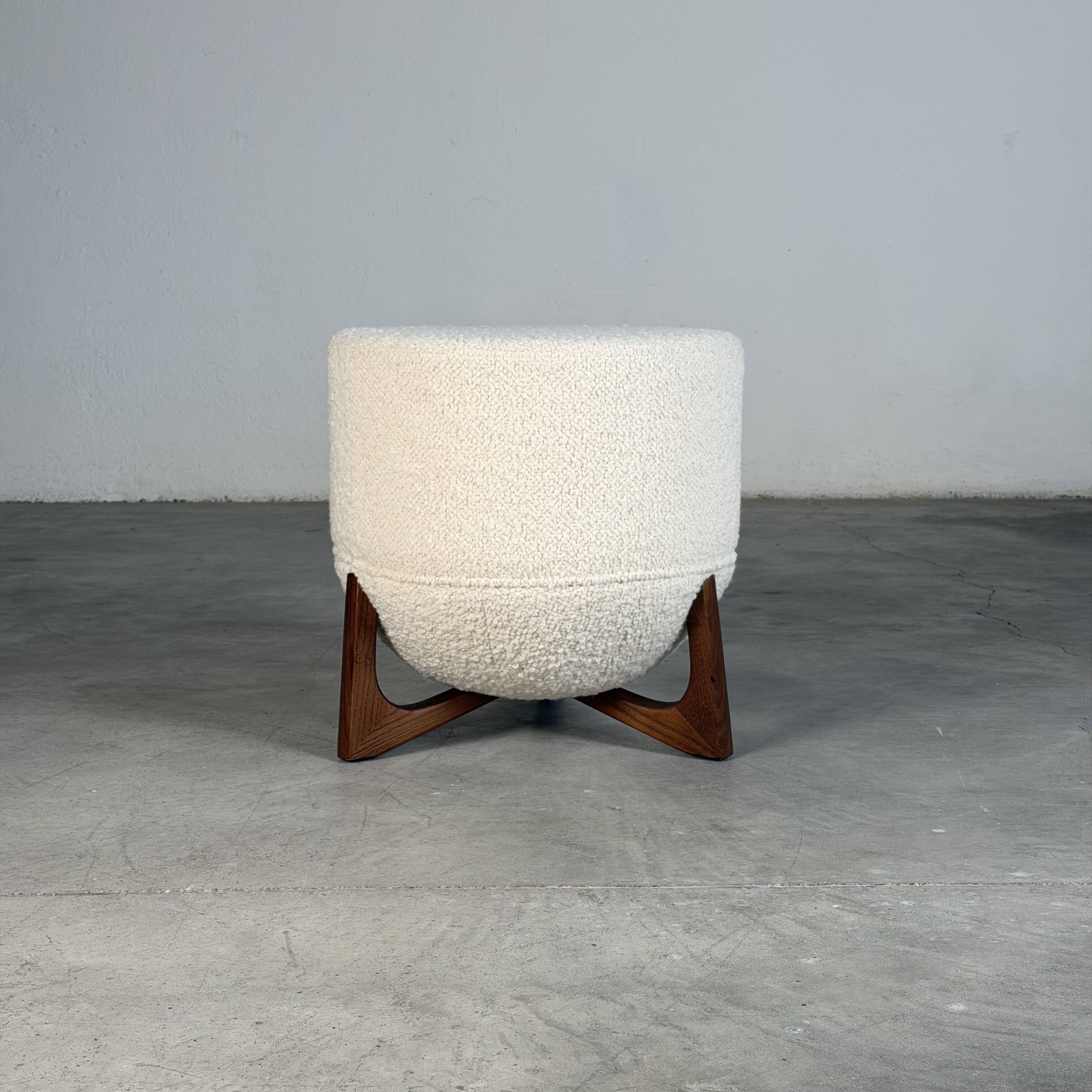 Totemo stool by forme, ivory dedar bouclé upholstery, walnut legs