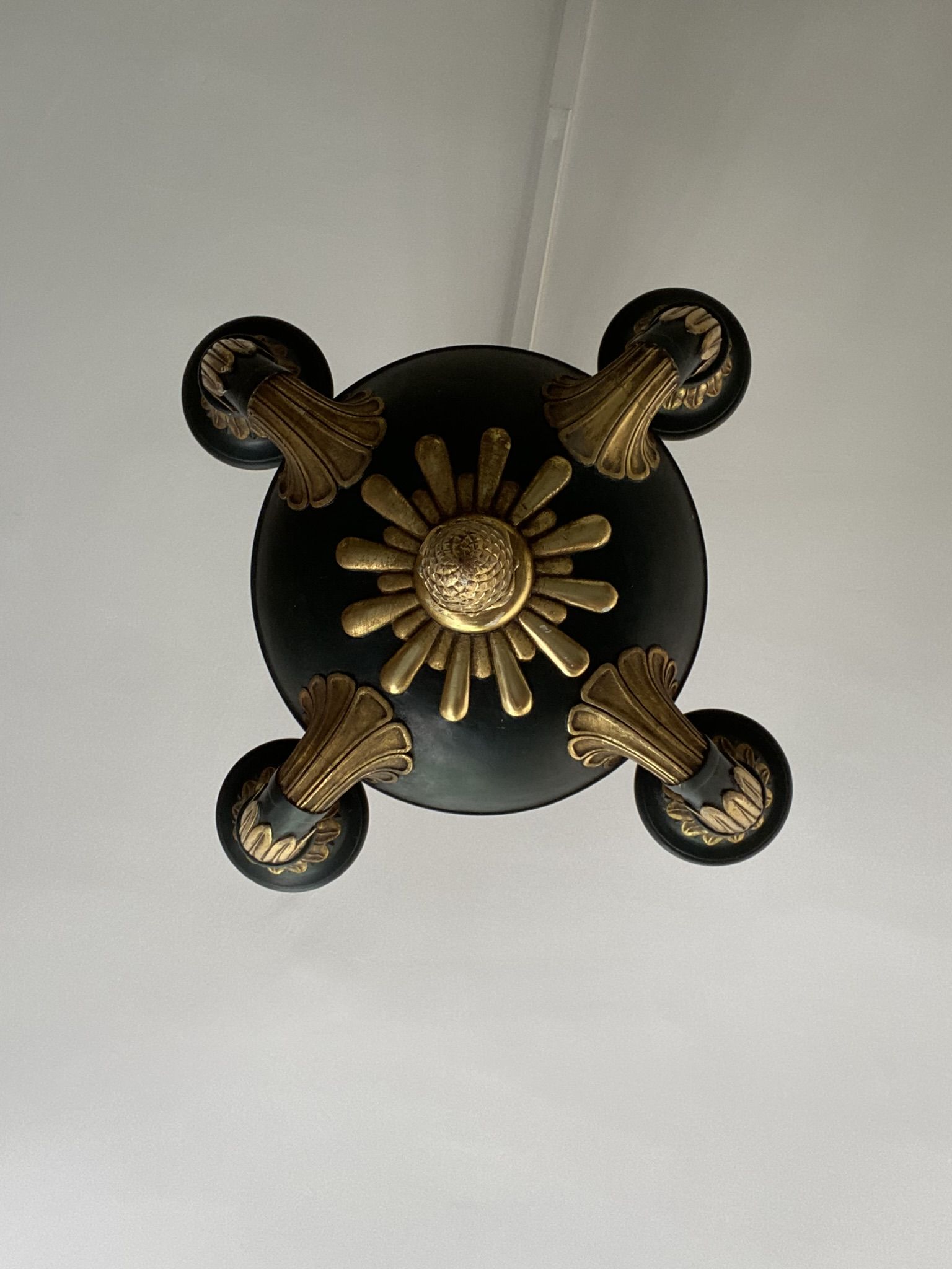 Empire style chandelier with four lights in sheet metal, bronze with patina and gilding