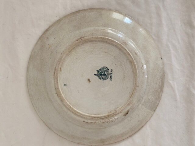 Round serving dish in iron earth