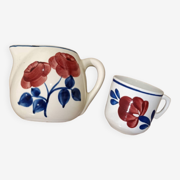 Milk jug and cup with rose decoration