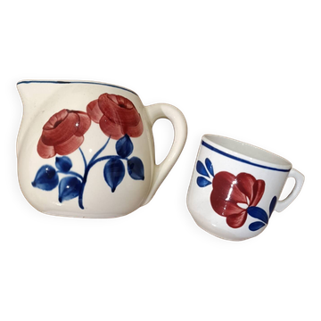 Milk jug and cup with rose decoration