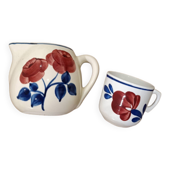 Milk jug and cup with rose decoration