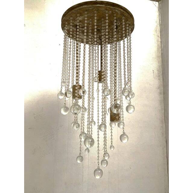 Contemporary cascade of transparent cristals murano glass chandelier