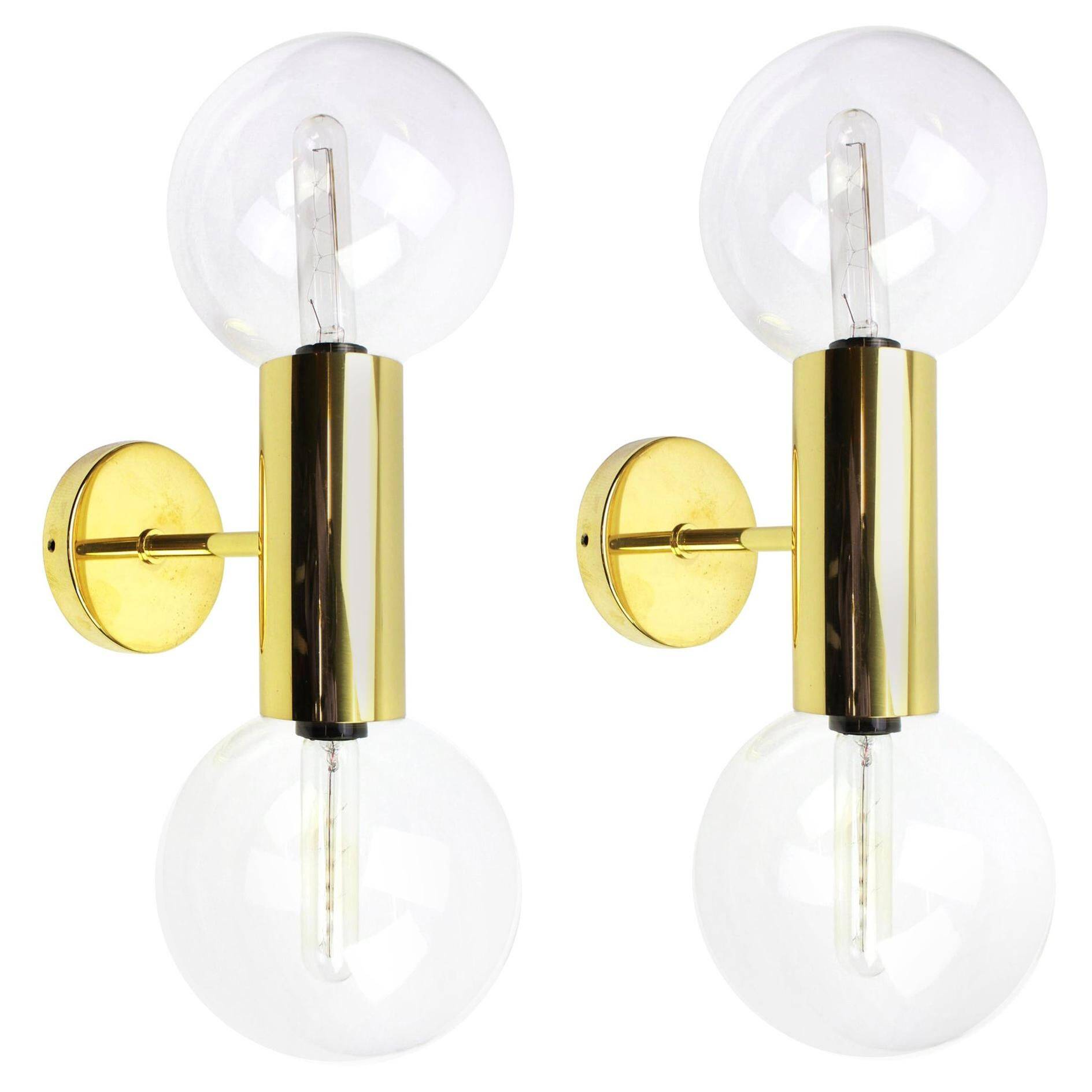 Pair of mid-century wall sconces designed by Motoko Ishii for Staff, Germany, 1970s.