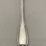 Silver metal sauce spoon