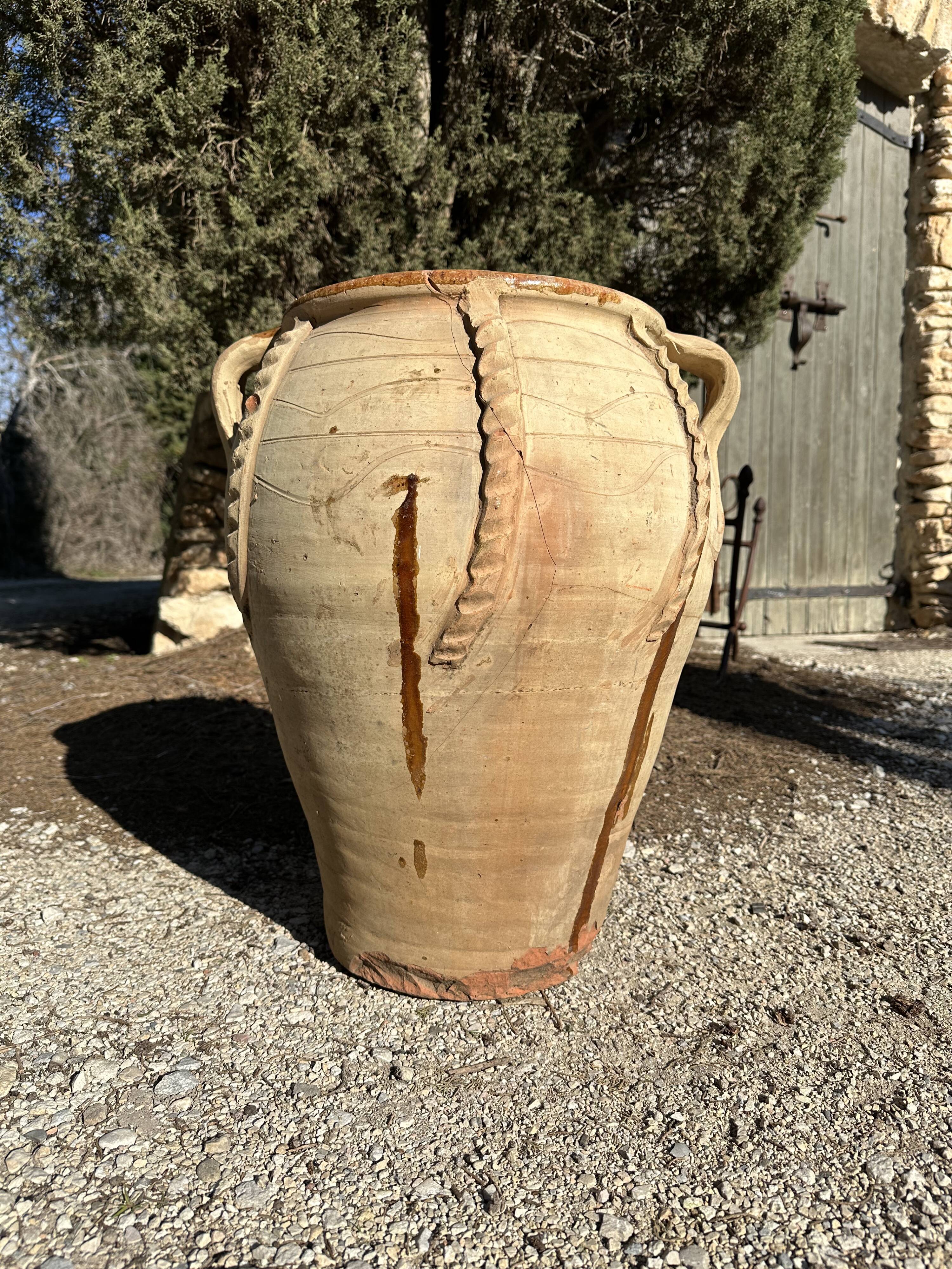 Ancient terracotta pottery jar