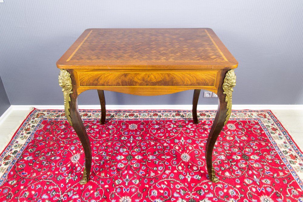 French Louis XV style table with bronze mounts