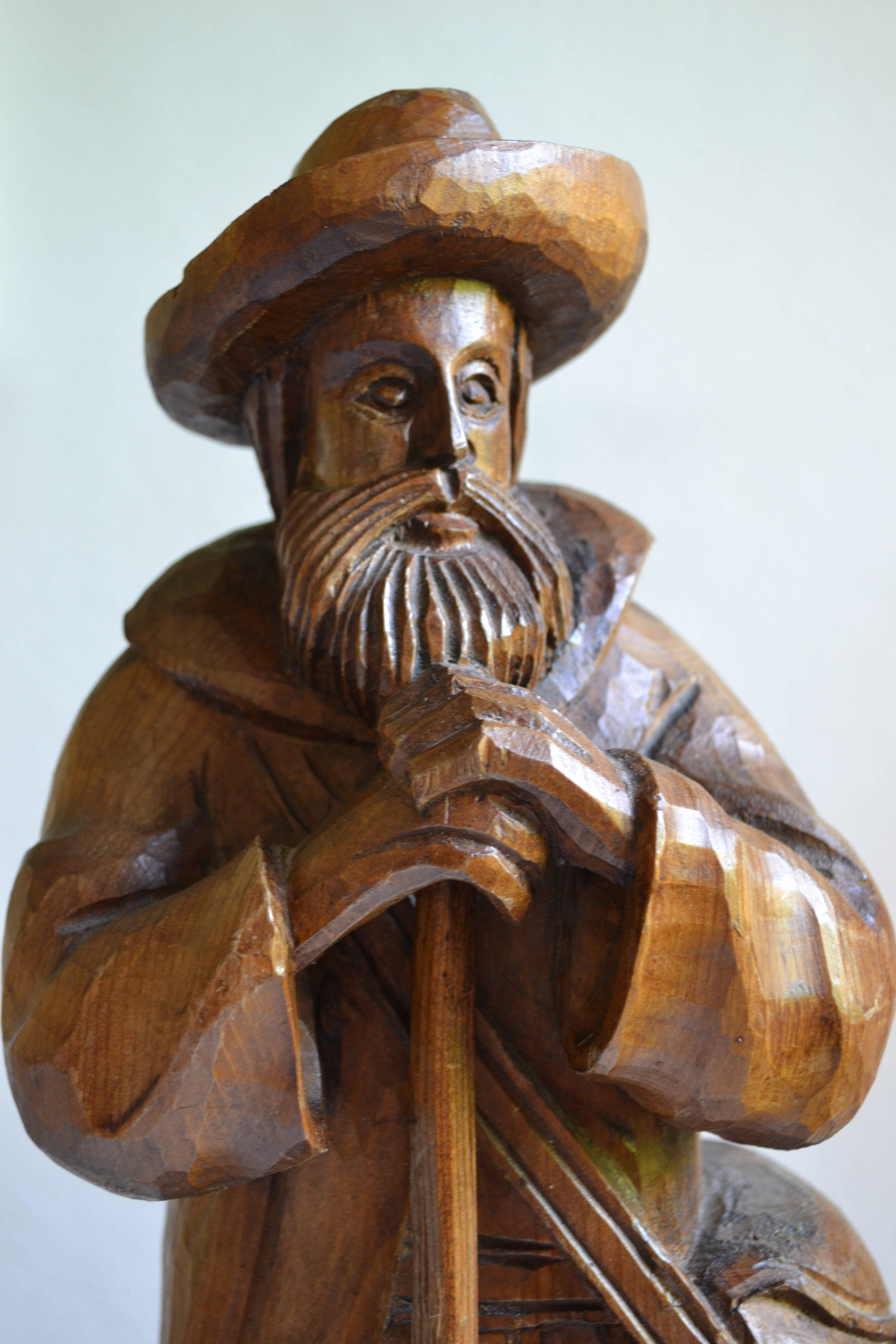 Large wooden sculpture of a man with his grain shovel 52 cm