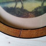 Three small round paintings