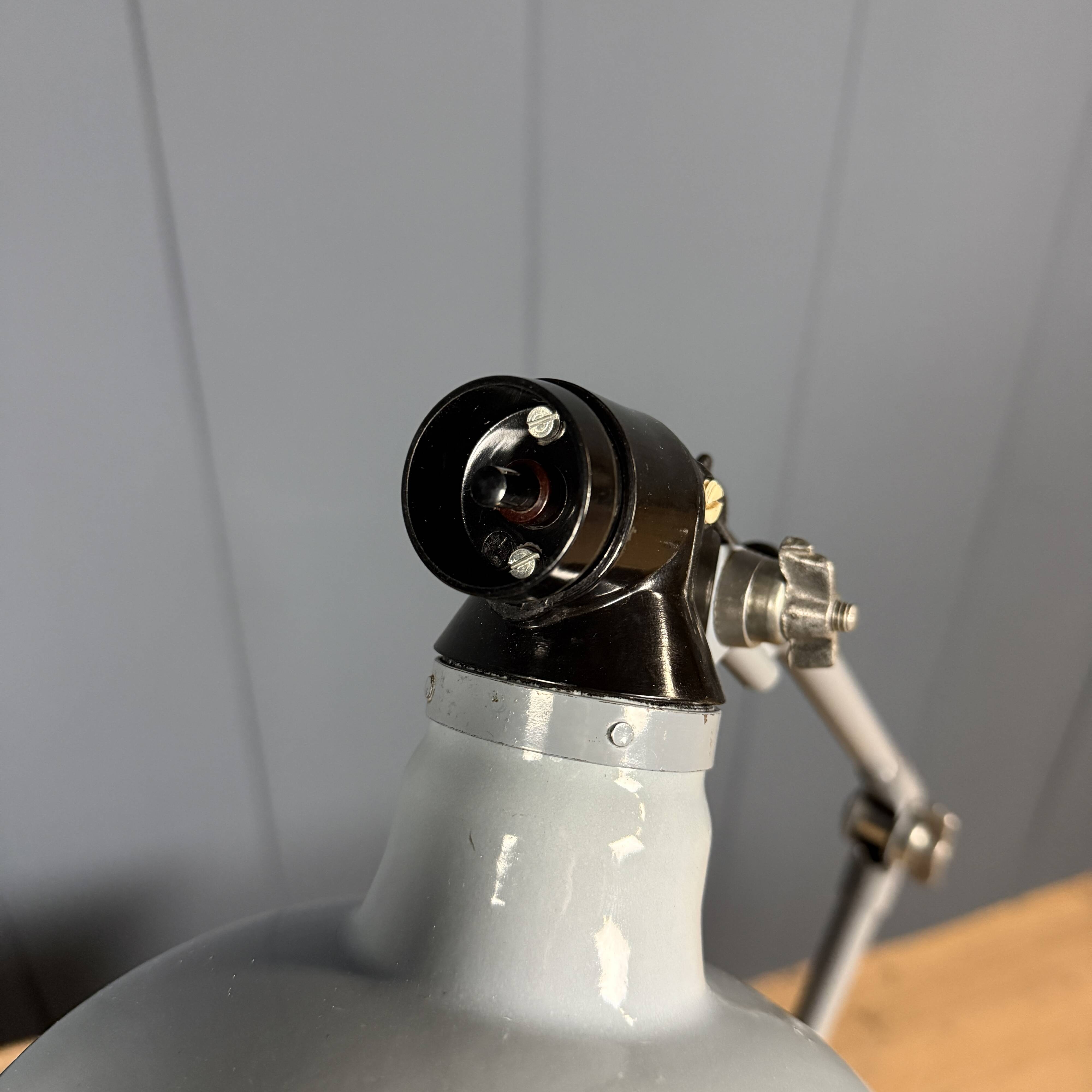 Light grey Rademacher clamp lamp with large enamel shade