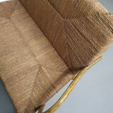 Vintage French papercord sofa with a metal frame base