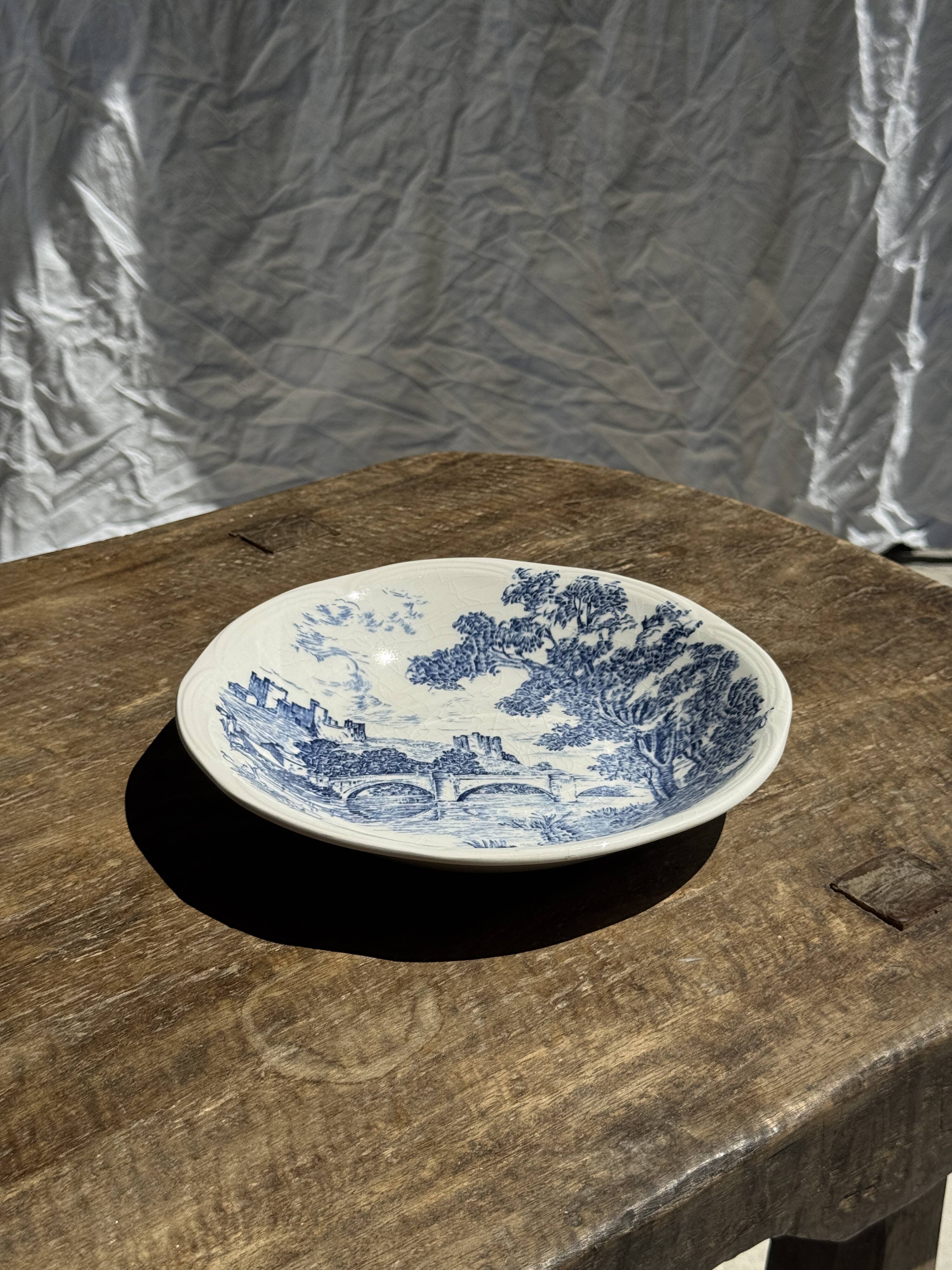 Small deep Gien earthenware plate with blue landscape motif D21.5