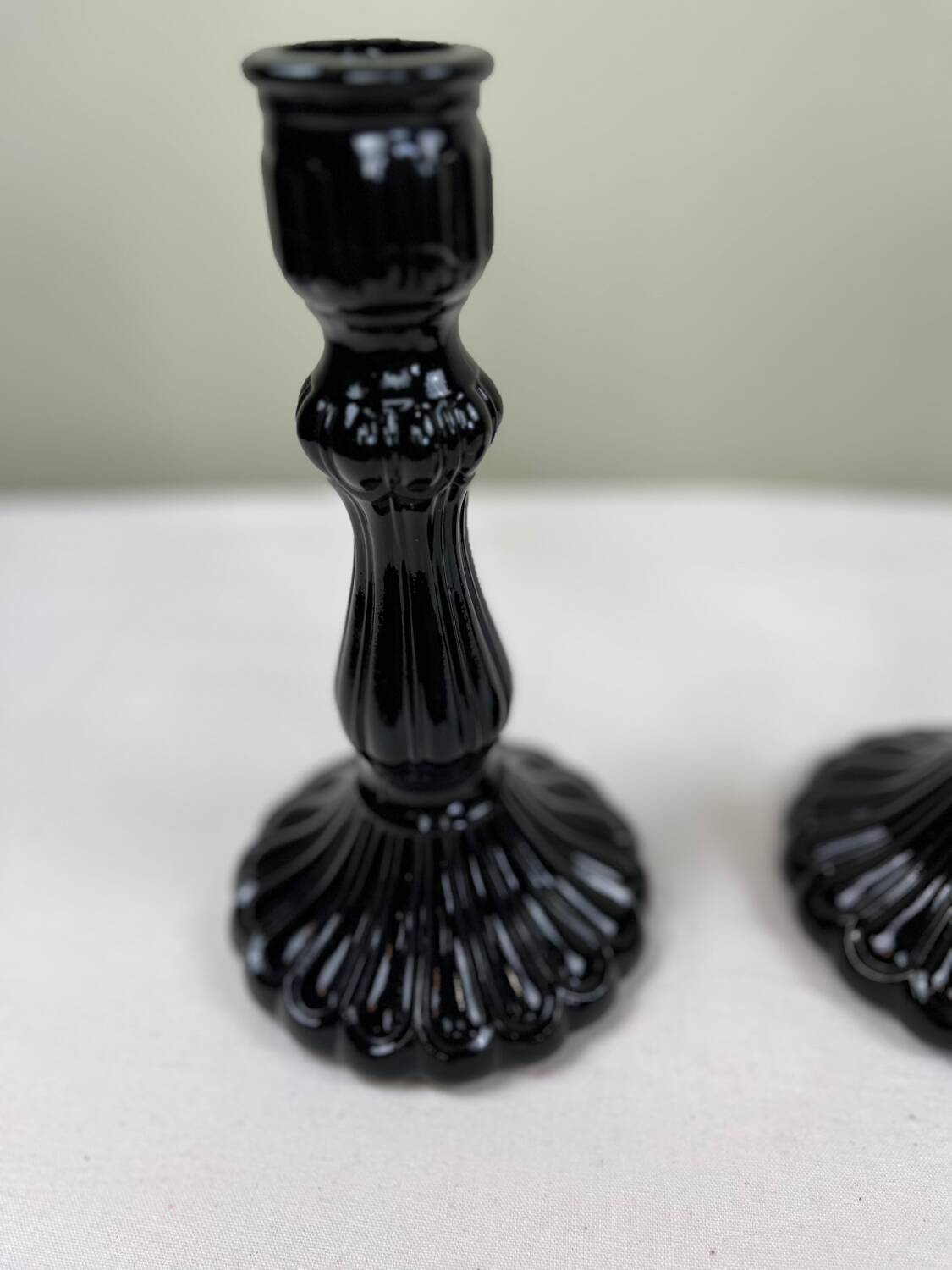 Pair of black opaline candlesticks