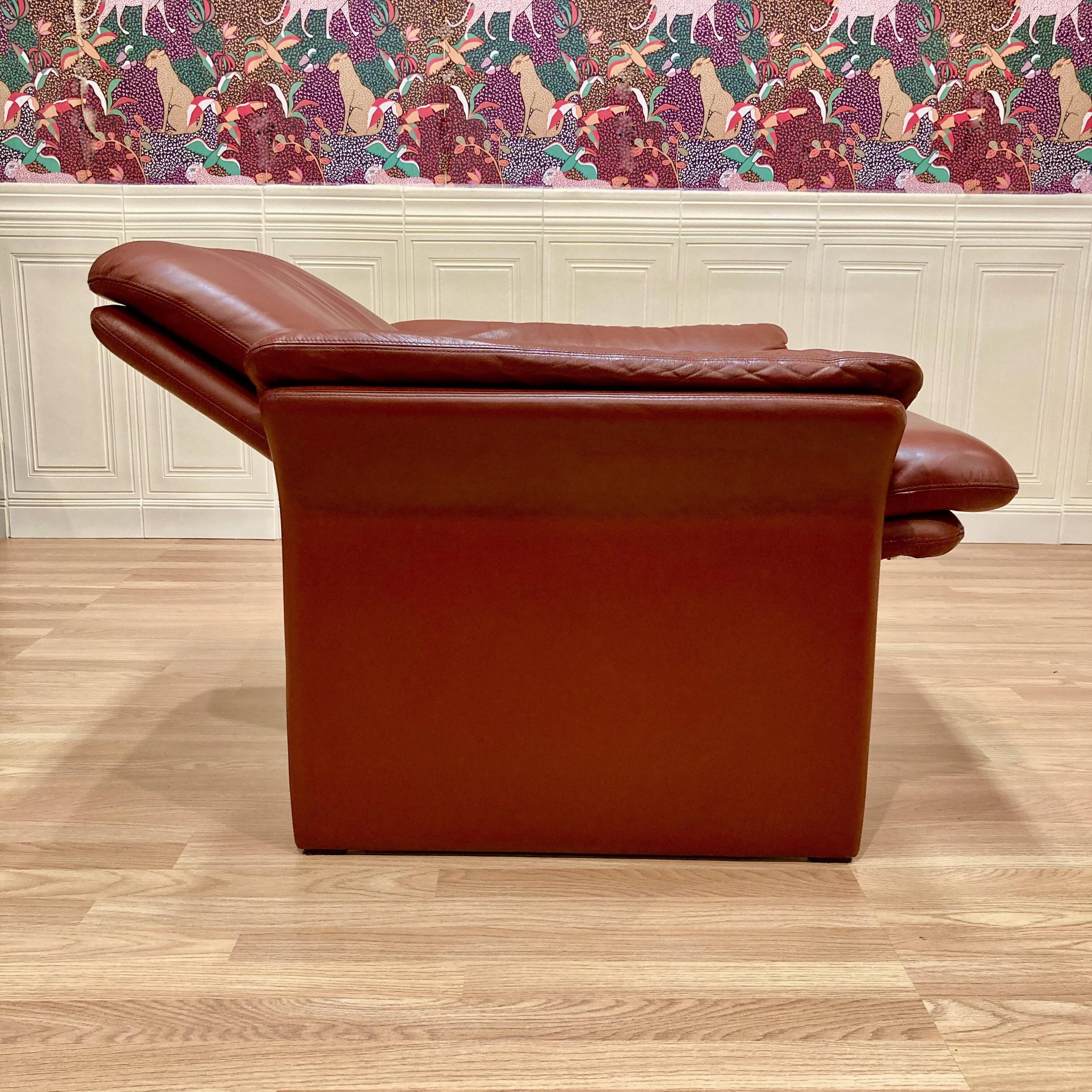 Pair of "Erpo" designer adjustable leather armchairs.