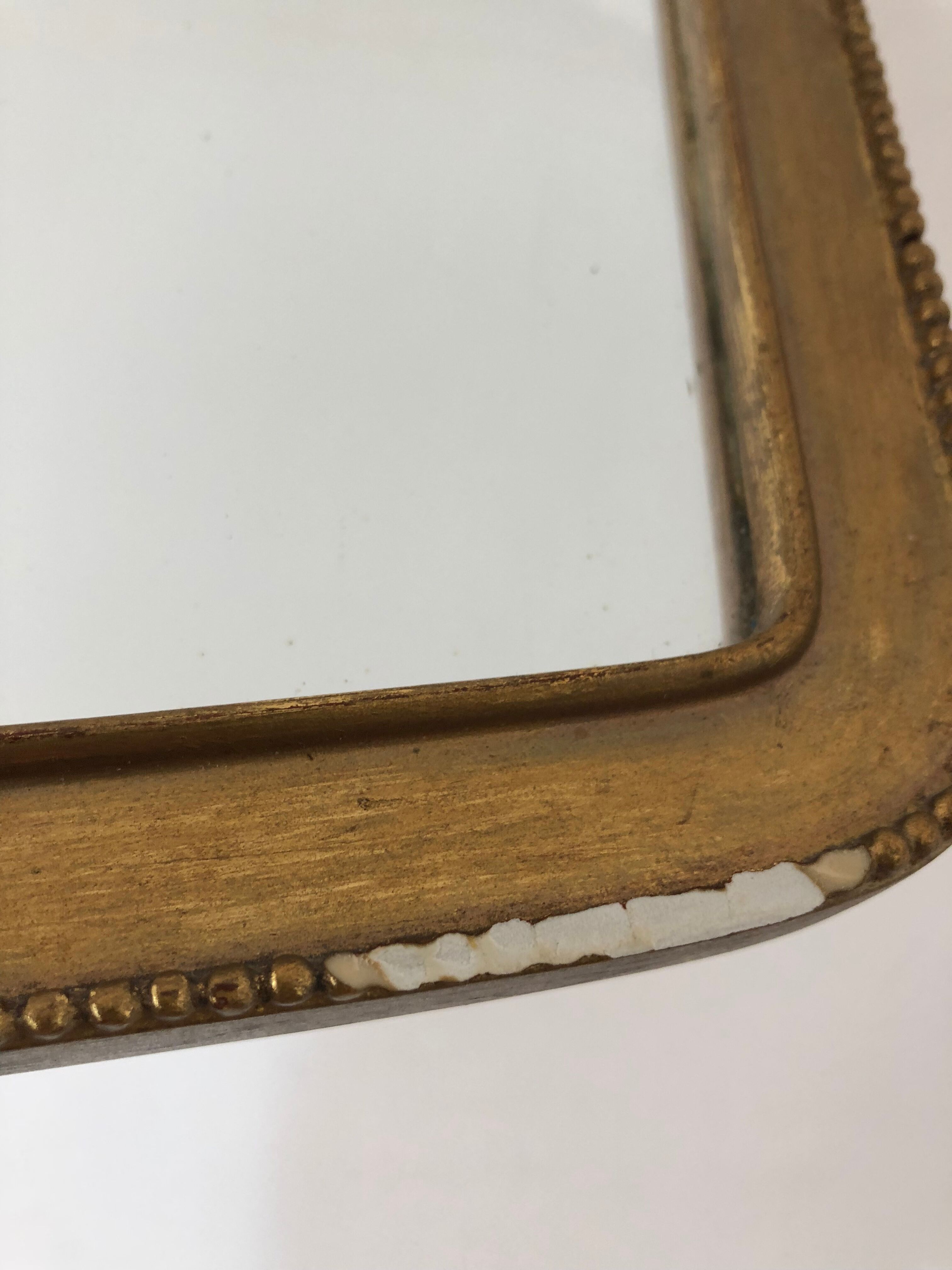 Miroir vintage en bois doré 30x15cm