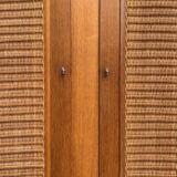 Rattan wardrobe and its compass-legged chest of drawers, 1960