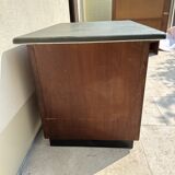 Modernist desk in wood and green moleskin upholstery