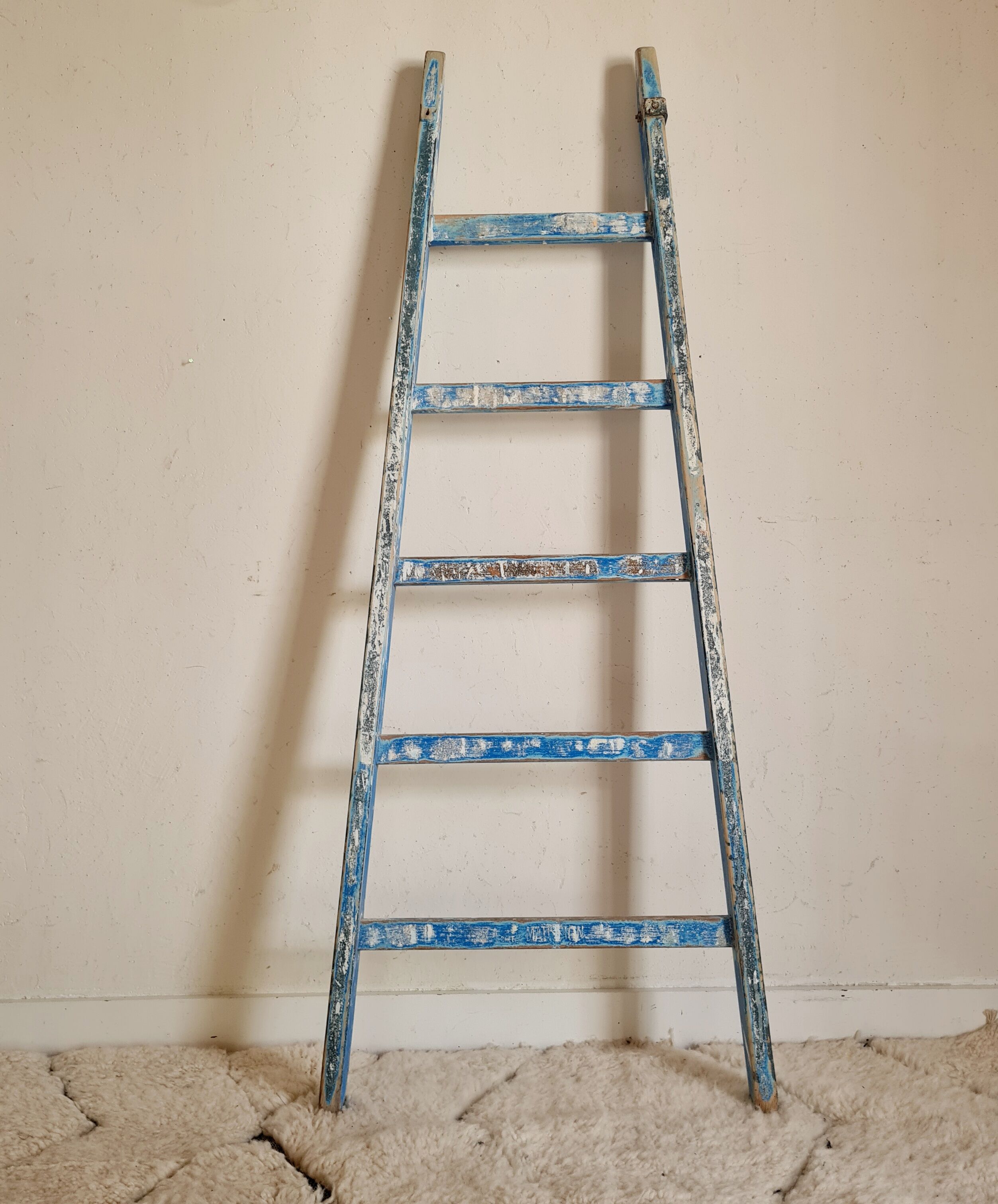 Old blue wooden ladder