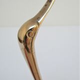 Pair of stylized birds in solid brass