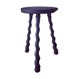 Wooden tripod farm stool