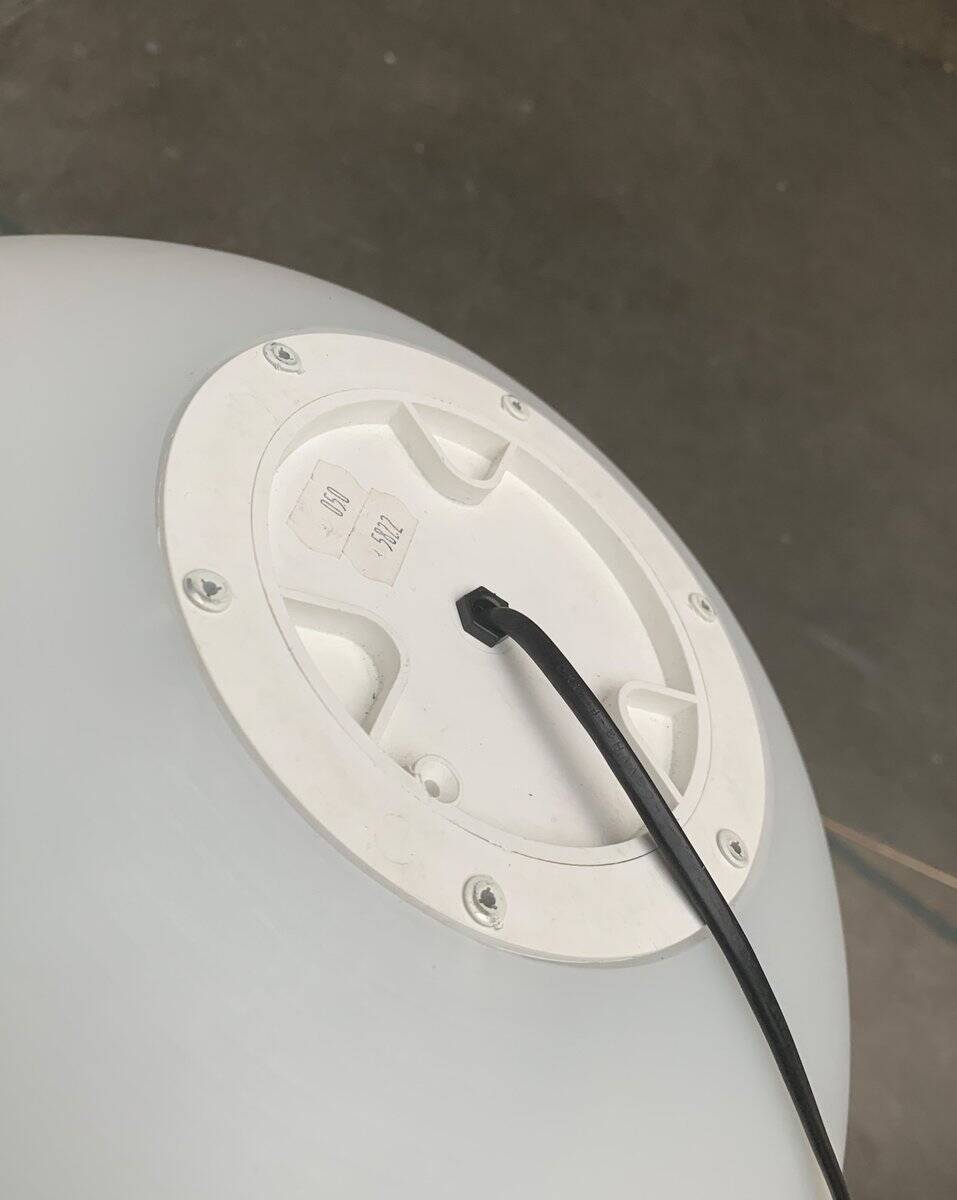 Vintage floor lamp in the shape of a globe from the French space age by SCE, France.