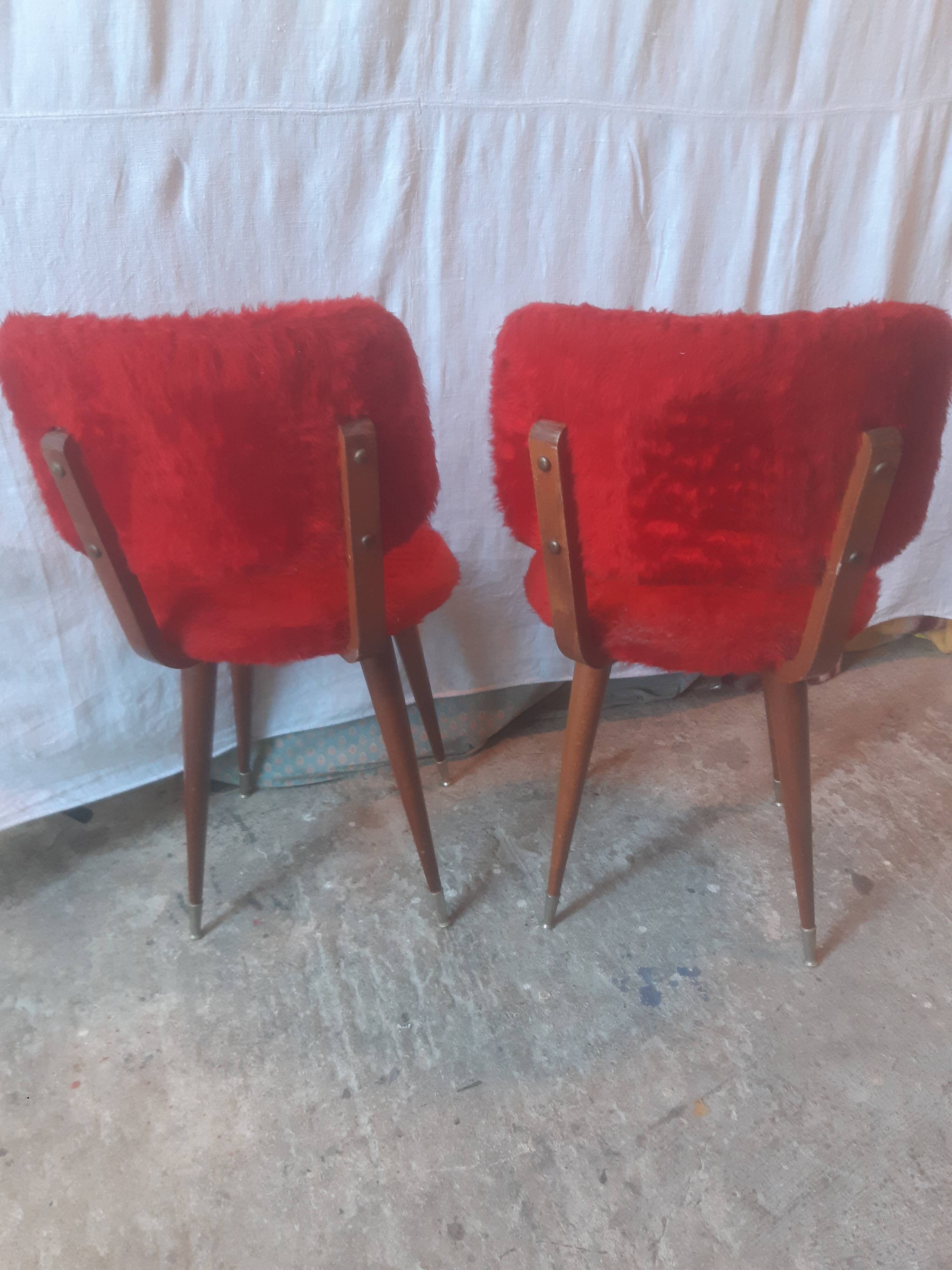 Plush chairs with compass legs