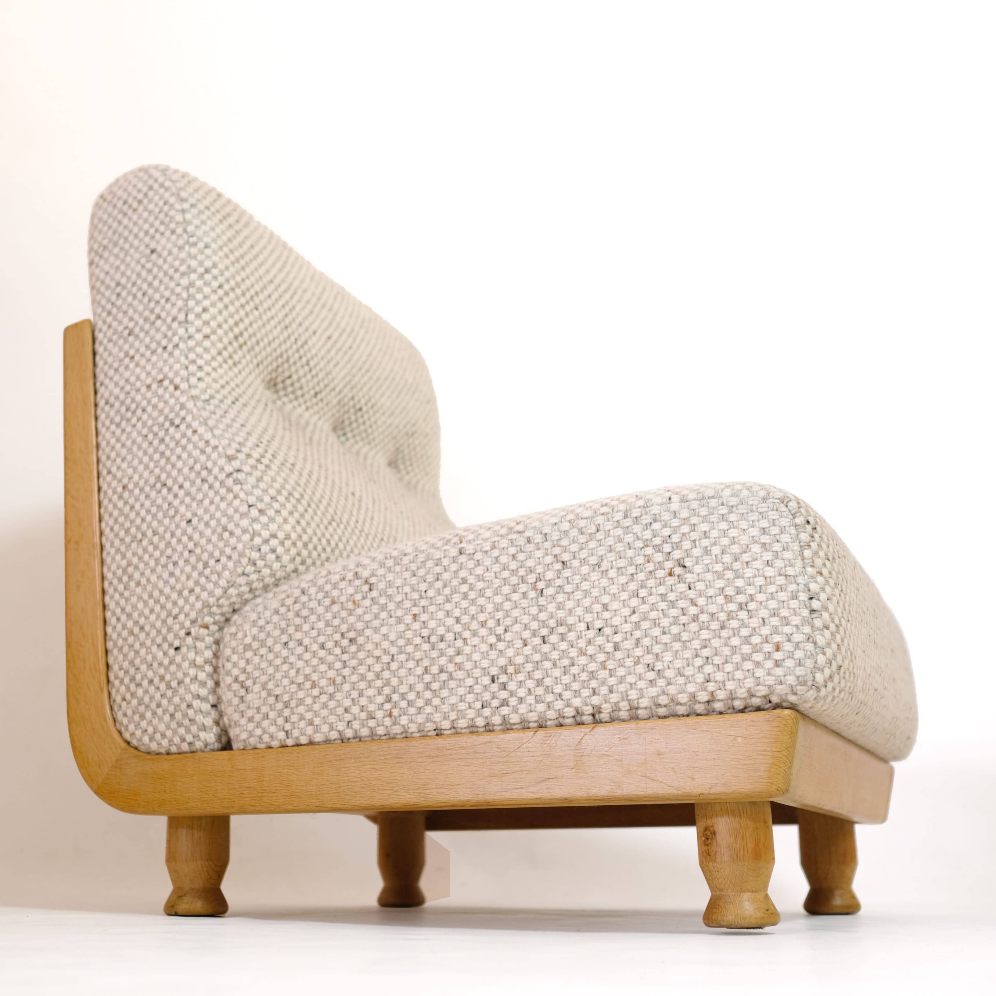 Robert Guillerme & Jacques Chambron, armchair upholstered in beige fabric.