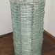 Blue-tinted glass lamp and wire.