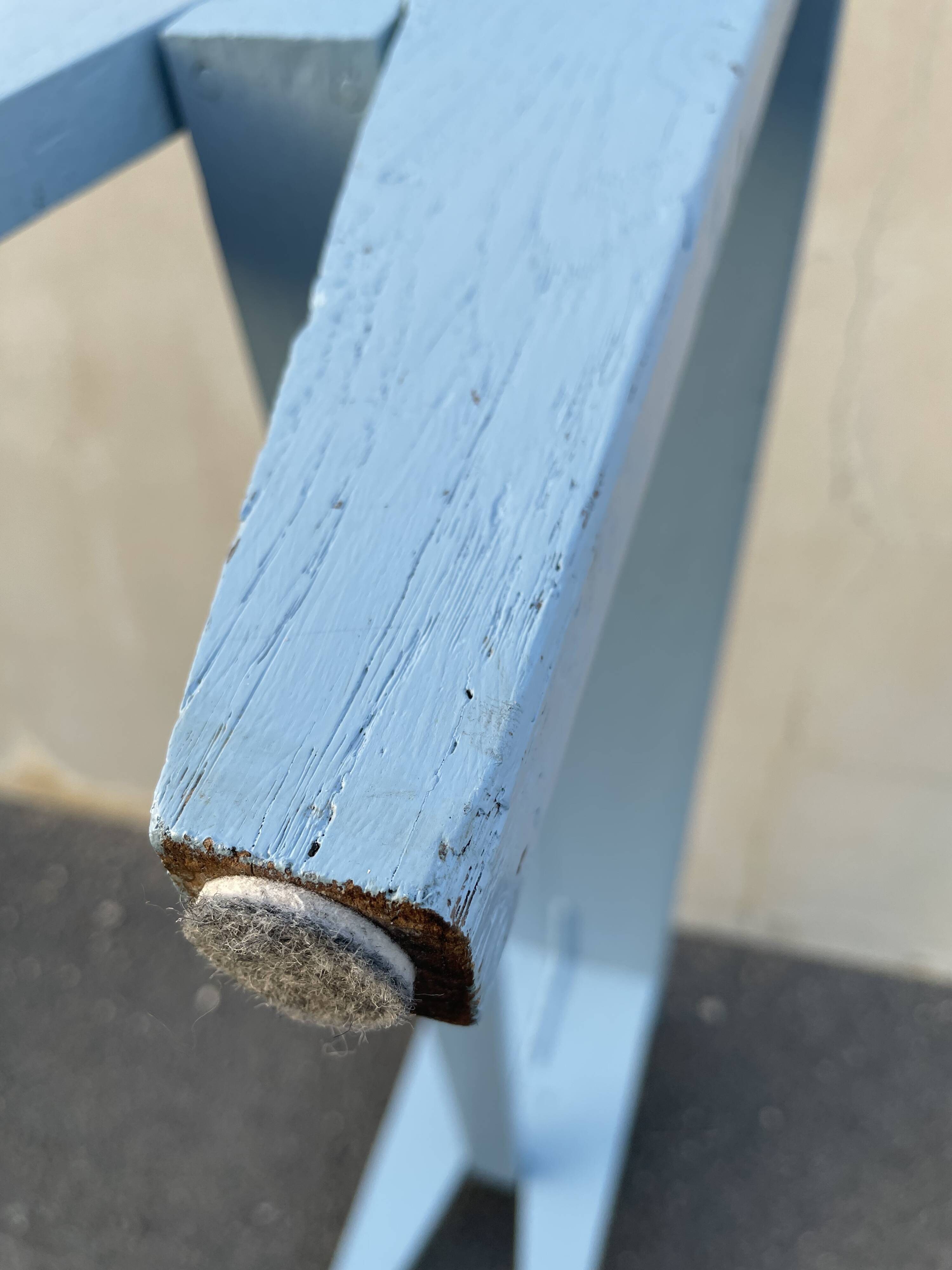 Blue painted wooden bench