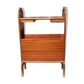 Table with drawers for magazines and glass top.