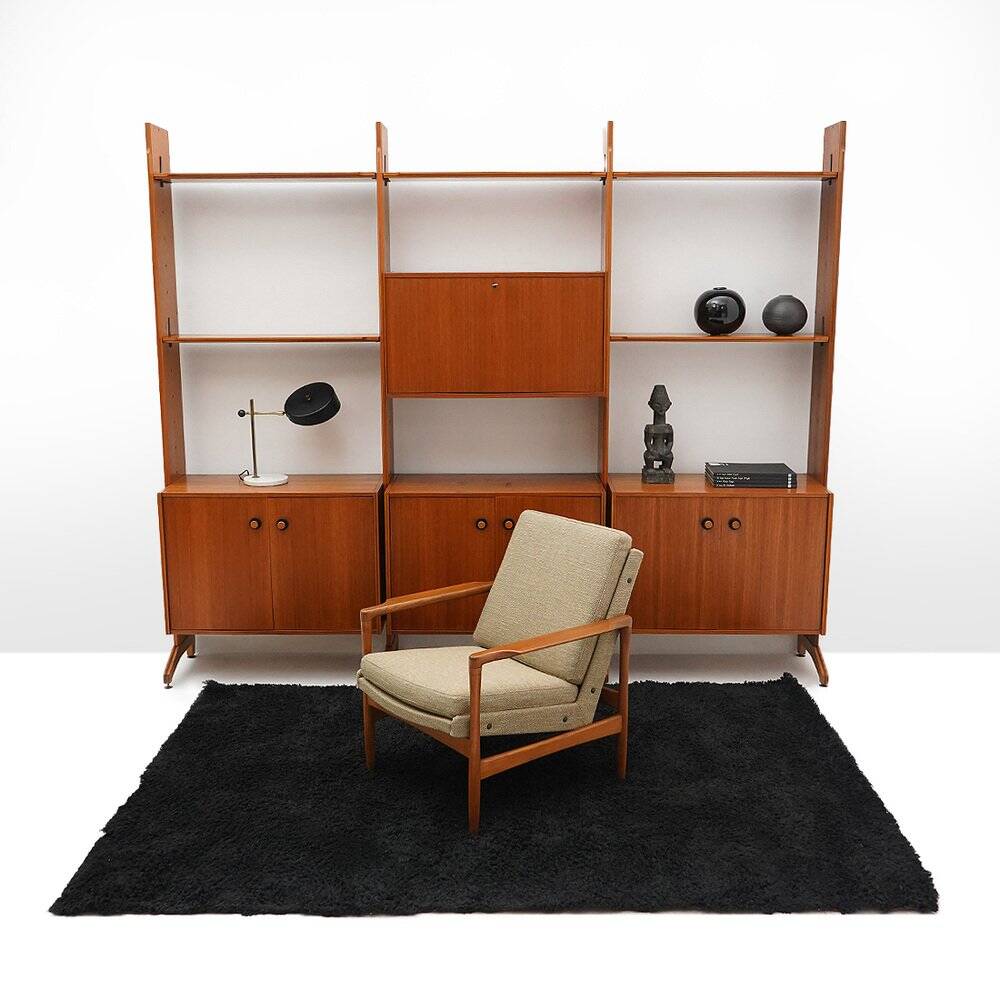 Library with wooden uprights by A.V. Contemporary Furnishings, 1960s.