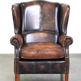 Fauteuil à oreilles en cuir de vache de style anglais avec des couleurs uniques et un excellent confort
