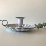 Candlestick in white enameled metal