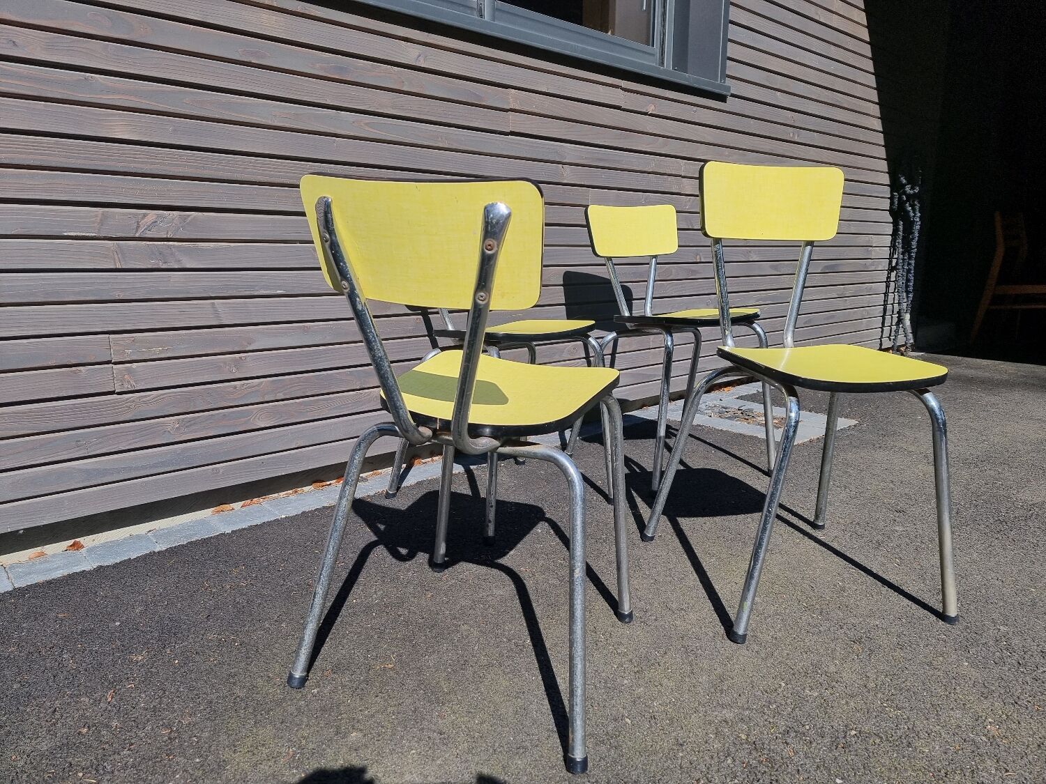 4 vintage Formica yellow chairs