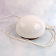 Opaline Scandinavian style bedside lamp on wood
